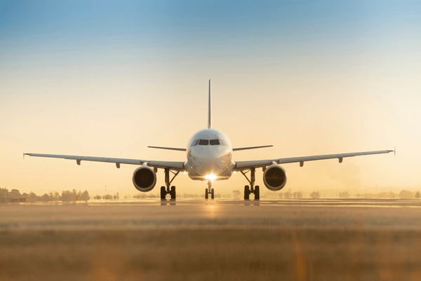 sunset-view-airplane-on-airport-600nw-1889546404